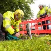 Openreach engineers at work on rural grass verge